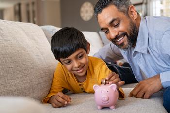 Want to Retire As a Millionaire? Follow This Formula: https://g.foolcdn.com/editorial/images/738339/piggy-bank-dad-teaching-son-to-save-money.jpg