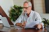 3 Things That Might Happen if You Don't Make Changes During Medicare Open Enrollment: https://g.foolcdn.com/editorial/images/705973/older-man-laptop-holding-papers-gettyimages-1264327699.jpg