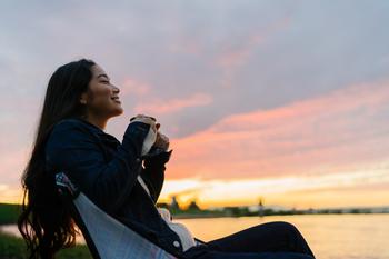 3 Reasons Why Coca-Cola Stock Just Hit an All-Time High: https://g.foolcdn.com/editorial/images/784924/enjoying-a-cup-at-sunset.jpg