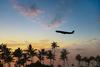 Why Airline Stocks Are Soaring Today: https://g.foolcdn.com/editorial/images/708883/silhouette-of-airplane-flying-over-palm-trees-in-sunset-getty.jpg