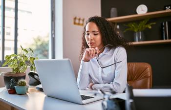 Is Buying Stocks With the S&P 500 at an All-Time High a Smart Idea? History Provides a Clear Answer.: https://g.foolcdn.com/editorial/images/777219/gettyimages-woman-at-desk-thinking.jpeg