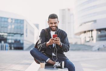 Great News for Apple and Qualcomm Stock Investors: https://g.foolcdn.com/editorial/images/789073/a-person-looking-at-their-phone-2.jpg