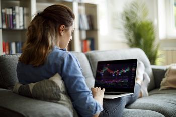 3 of the Safest Dividend Stocks on Earth: https://g.foolcdn.com/editorial/images/743720/dividends-woman-laptop-stock-charts.jpg