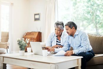 Statistics Say This Is the Best Age to Claim Social Security: https://g.foolcdn.com/editorial/images/782333/retired-couple-reviews-finances-investing-portflio.jpg