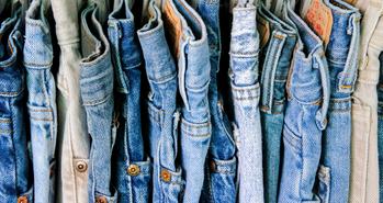 A Bull Market Is Coming: 3 Reasons to Buy Levi Strauss Stock: https://g.foolcdn.com/editorial/images/721373/denim-jeans-on-hangars.jpg