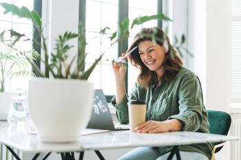 Be the Breadwinner: 6 Steps to Securing Your Financial Future: https://g.foolcdn.com/editorial/images/733340/woman-working-from-home-office_Ogo4mzq.jpg