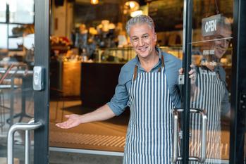Getting a Part-Time Job in Retirement? Beware This Pitfall: https://g.foolcdn.com/editorial/images/700244/older-man-wearing-apron-in-cafe-doorway-gettyimages-1003743868.jpg