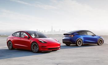 This "Magnificent Seven" Stock Is Up 120% in 2023. Here's a 2024 Red Flag Investors Must Know About: https://g.foolcdn.com/editorial/images/758739/two-teslas-parked-near-each-other.jpg
