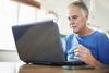 3 Times a Lower Social Security Benefit Is Worth It: https://g.foolcdn.com/editorial/images/731256/older-man-laptop-confused-gettyimages-1371314132.jpg