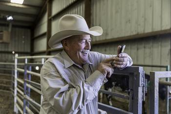 Why Boot Barn Stock Surged to an All-Time High Today: https://g.foolcdn.com/editorial/images/790265/person-wearing-cowboy-hat-smiling-in-barn.jpg