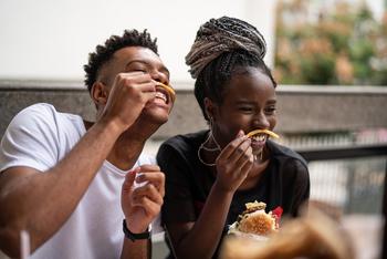 There's More to Restaurants Brands International's $1 Billion Acquisition Than Meets the Eye: https://g.foolcdn.com/editorial/images/762203/24_01_22-two-people-eating-burgers-and-fries-outside-_mf-dload-gettyimages-972911836-1200x800-5b2df79.jpg