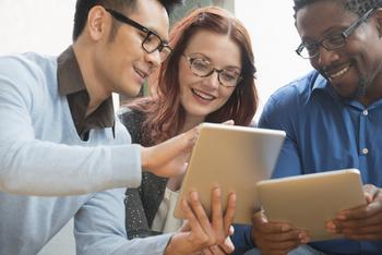 Better Growth Stock: CRISPR Therapeutics vs. Teladoc Health: https://g.foolcdn.com/editorial/images/733575/gettyimages-three-business-people-use-tablets.jpg