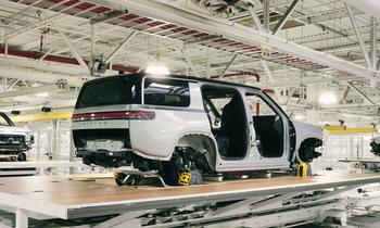 Where Will Rivian Stock Be in 2024?: https://g.foolcdn.com/editorial/images/759749/suv-on-assembly-line-with-_rivian-badge-logo_rivian.jpg