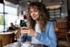 This Is the Best Retirement Planning Move I Ever Made: https://g.foolcdn.com/editorial/images/787770/smiling-person-looking-at-smartphone-in-coffee-shop.jpg