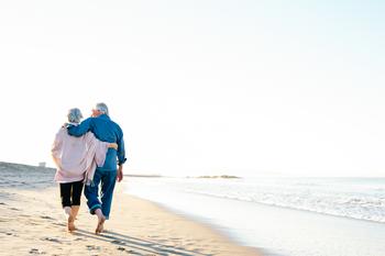 When Can a Spouse Collect Social Security?: https://g.foolcdn.com/editorial/images/735120/two-older-people-walking-on-the-beach.jpg