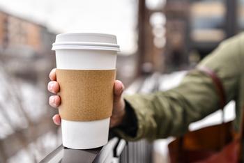 Should You Buy This Magnificent Dividend Stock With $100 While It's Down 28%?: https://g.foolcdn.com/editorial/images/770653/coffee-to-go-cup.jpg
