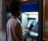 You Don't Have to Pick a Winner in Banks. Here's Why.: https://g.foolcdn.com/editorial/images/753030/customer-at-a-bank-atm-gettyimages-1081379790.jpg
