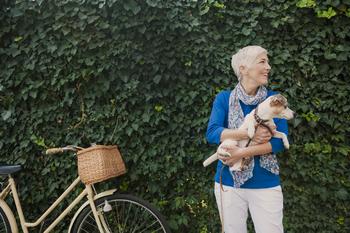 Here's a Simple Solution to Help You Choose Between a Roth and Traditional IRA: https://g.foolcdn.com/editorial/images/750700/mature-woman-holding-dog.jpg