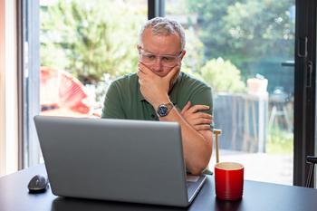 Here's Why It Pays to Imagine a Retirement Without Social Security: https://g.foolcdn.com/editorial/images/746945/man-40s-laptop-by-window-gettyimages-1403978354.jpg