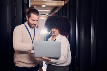 Why Broadcom Stock Surged 21% Higher in June: https://g.foolcdn.com/editorial/images/782362/two-young-professionals-looking-at-a-laptop-in-a-data-center.jpg