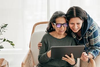 This Is the Average 401(k) Balance for Ages 55 to 64: https://g.foolcdn.com/editorial/images/780501/two-people-looking-at-a-tablet-and-smiling.jpg