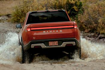 This Massive Hedge Fund Just Upped Its Stake in 1 EV Maker by 4,221%: https://g.foolcdn.com/editorial/images/772601/2022-rivian-r1t-18.jpg