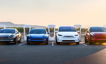 Tesla Stock Is Down 60%. How Much Further Could It Tumble?: https://g.foolcdn.com/editorial/images/772994/4-teslas-in-a-line-at-a-charging-station.png