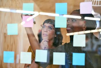 Pfizer Stock: Bear vs. Bull: https://g.foolcdn.com/editorial/images/747854/two-investors-put-sticky-notes-on-glass-wall.jpg