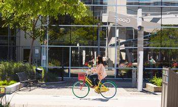 Does Alphabet's Dividend Mean Anything to Investors?: https://g.foolcdn.com/editorial/images/775072/person-biking-on-google-campus-with-google-logo-reflection-in-background_alphabet_google.jpg