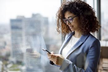 Why Apple Stock Rallied Friday Morning: https://g.foolcdn.com/editorial/images/731216/well-dressed-person-in-an-office-looking-at-a-smartphone.jpg