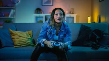 Why AppLovin Stock Cratered on Tuesday: https://g.foolcdn.com/editorial/images/695309/young-person-holding-a-gaming-controller-sitting-on-a-couch-in-a-darkened-room.jpg