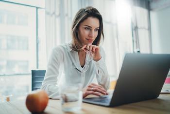 Billionaires Are Buying These 2 Top Artificial Intelligence (AI) Stocks Hand Over Fist: https://g.foolcdn.com/editorial/images/789992/analyst-smiling-and-looking-at-laptop.jpg