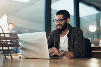 4 Reasons to Buy Alphabet Stock and 2 Reasons to Sell: https://g.foolcdn.com/editorial/images/759283/businessman_working_on_a_laptop.jpg