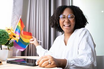 These 3 Simple ETFs Could Turn $500 a Month Into $1.5 Million: https://g.foolcdn.com/editorial/images/783612/getty-smiling-happy-at-desk-rainbow-flag-lgbt.jpg