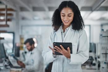 Forget Tesla: I Think This Stock Should Replace It in the "Magnificent Seven": https://g.foolcdn.com/editorial/images/768602/scientist-smiling-holding-tablet-computer.jpg