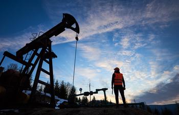 Why ExxonMobil Stock Tumbled Nearly 10% in 2023: https://g.foolcdn.com/editorial/images/761345/the-silhouette-of-a-person-next-to-an-oil-well.jpg