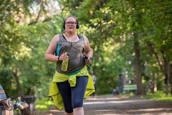 Best Stock to Buy Right Now: Nike vs. On Holding: https://g.foolcdn.com/editorial/images/785286/woman-running-in-the-park-with-a-bottle-of-water-listening-to-music.jpg