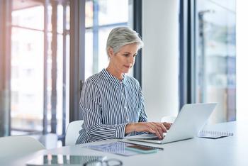 Suffering From Retirement Anxiety? 3 Ways to Overcome It.: https://g.foolcdn.com/editorial/images/780329/woman-older-laptop-gettyimages-1152601629.jpg