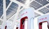 Where Will Tesla Be in 10 Years?: https://g.foolcdn.com/editorial/images/781607/group-of-tesla-super-chargers-with-logo-in-view.png