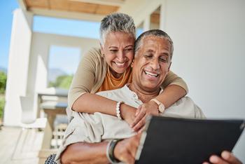 These 2 Cathie Wood ETFs Are Up 98% and 102% in 2023, and They Could Surge Higher in a Bull Market: https://g.foolcdn.com/editorial/images/759287/two-people-looking-at-a-computer-smiling.jpg