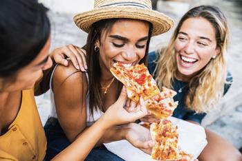 Why Domino's Pizza Stock Soared Monday: https://g.foolcdn.com/editorial/images/766822/friends-having-pizza-lunch.jpg