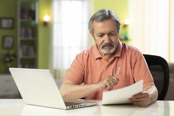 Retiring Early Could Have This Unintended Consequence for Your Social Security Checks: https://g.foolcdn.com/editorial/images/767228/mature-person-holding-pen-and-looking-at-document.jpg
