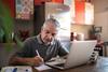 Retiring Really Soon? Here's the 1 Social Security Move It Pays to Make: https://g.foolcdn.com/editorial/images/748634/senior-man-laptop-taking-notes-gettyimages-1278336166.jpg