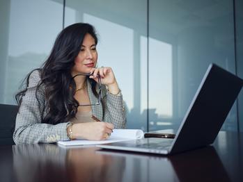 2 Popular Dividend Stocks That Aren't as Safe as They Seem: https://g.foolcdn.com/editorial/images/727385/investor-holds-glasses-while-considering-laptop.jpg