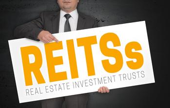 Is Realty Income a Buy Now?: https://g.foolcdn.com/editorial/images/744896/reits-sign-real-estate.jpg