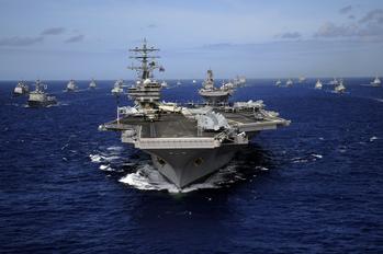 Will Anyone Win the Contract to Build the Navy's New Warship?: https://g.foolcdn.com/editorial/images/718670/carrier-strike-group-spearheaded-by-uss-ronald-reagan-at-sea.jpg