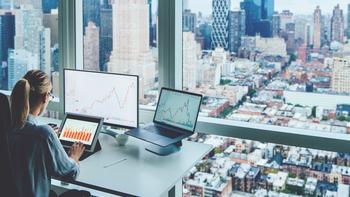 What's Going on With Dell Stock?: https://g.foolcdn.com/editorial/images/779391/person-at-big-city-office-window-with-multiple-screens.jpg