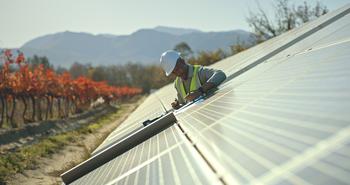 Is NextEra Energy a Millionaire Maker?: https://g.foolcdn.com/editorial/images/781400/solar-farm-worker.jpg