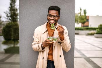 Why Sweetgreen Stock Soared on the Market's Down Day: https://g.foolcdn.com/editorial/images/738750/person-eats-salad-standing-up-outside.jpg