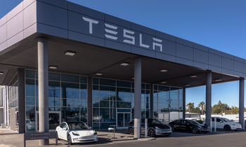 Tesla's Cash Flow Turned Negative as Inventory Piled Up: https://g.foolcdn.com/editorial/images/774909/tesla-sales-building-with-tesla-logo-and-teslas-parked-in-front.png